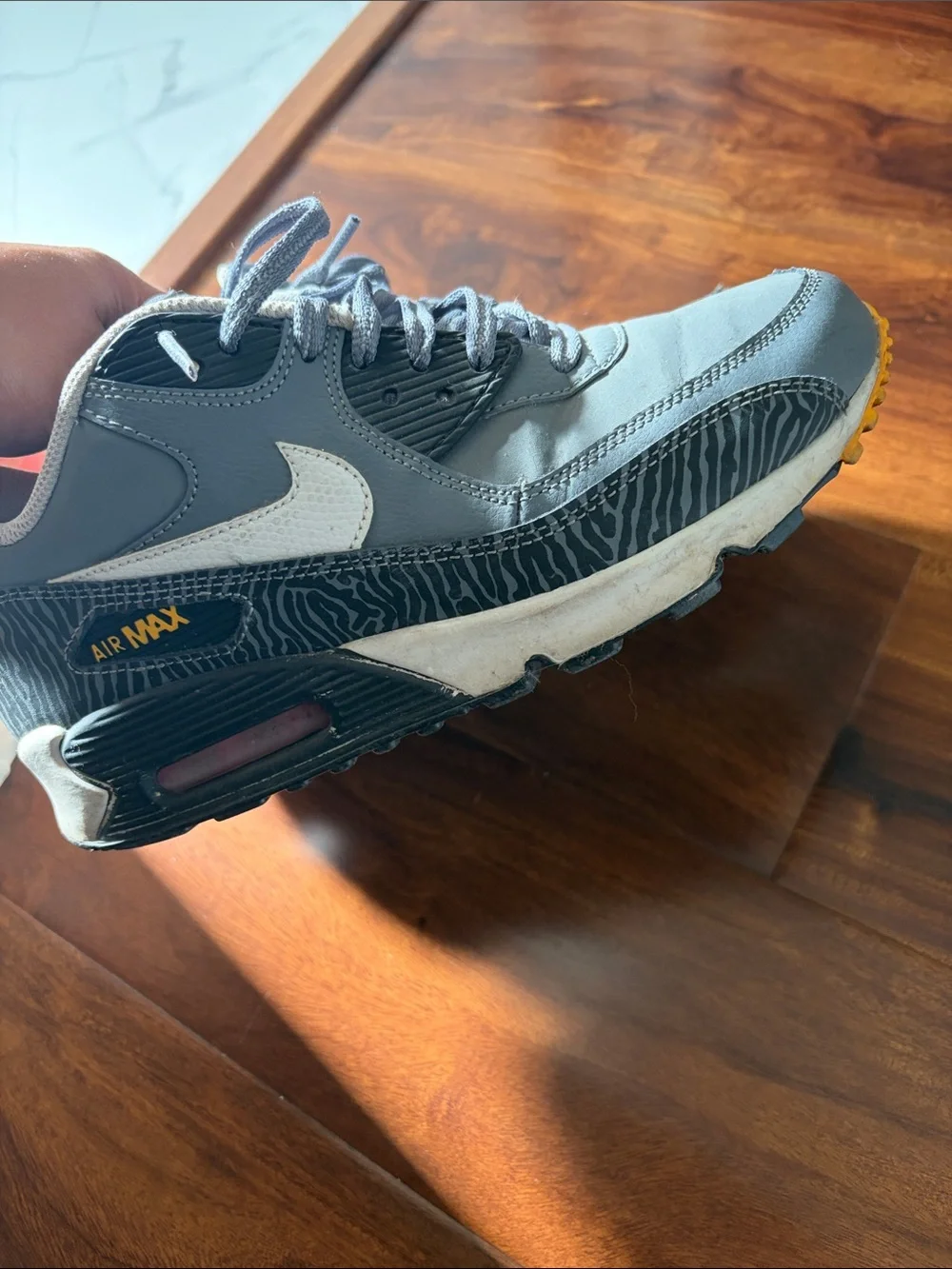 Nike Gray Sneakers with Pink Logo and Yellow Outsole